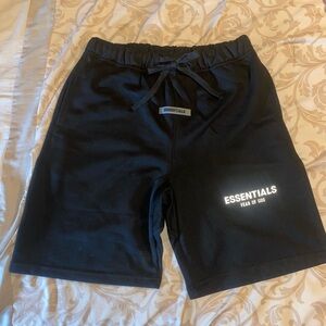 Essentials fear of god. Kids shorts size large .